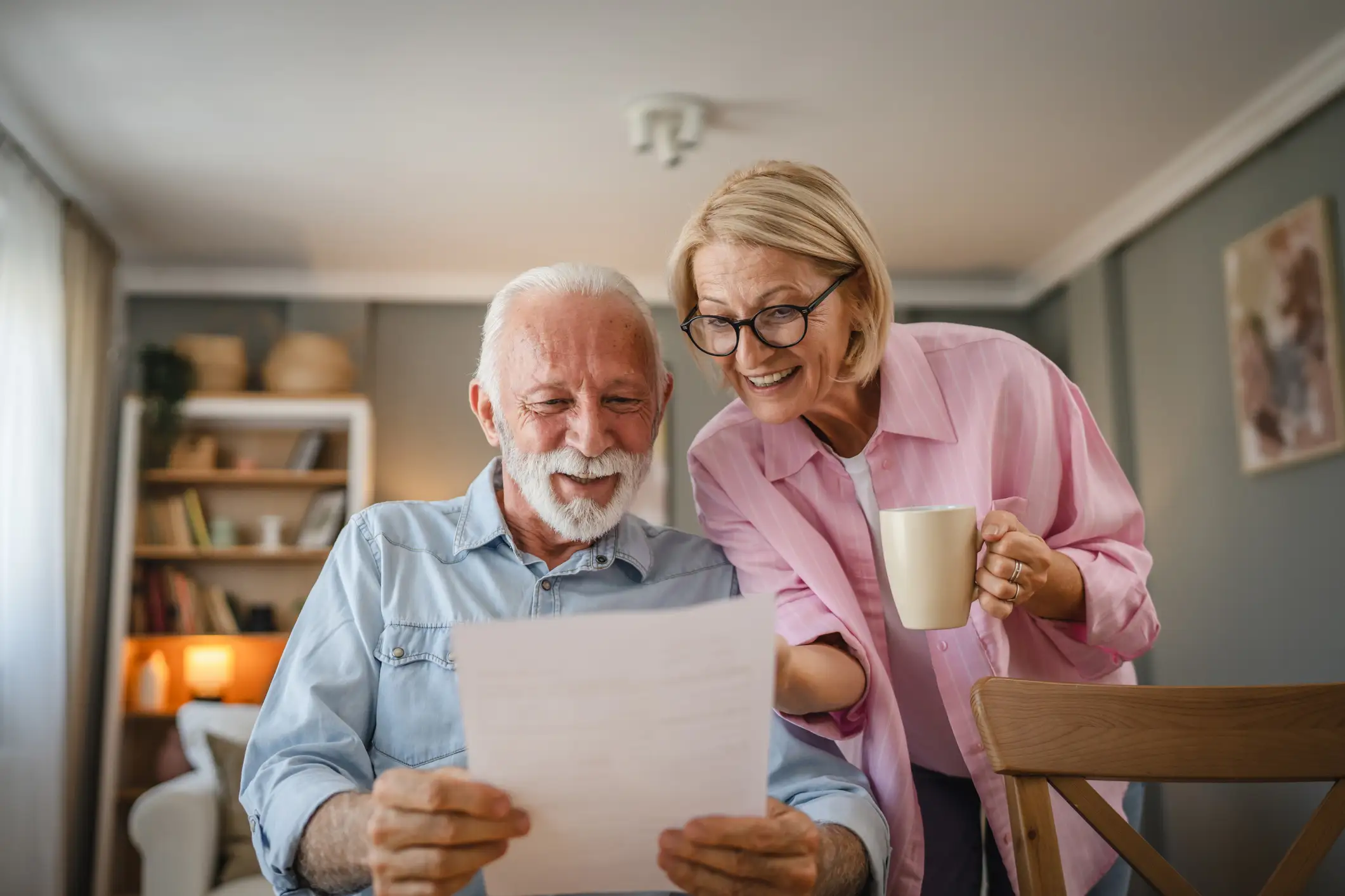 Senior couple reviewing a document